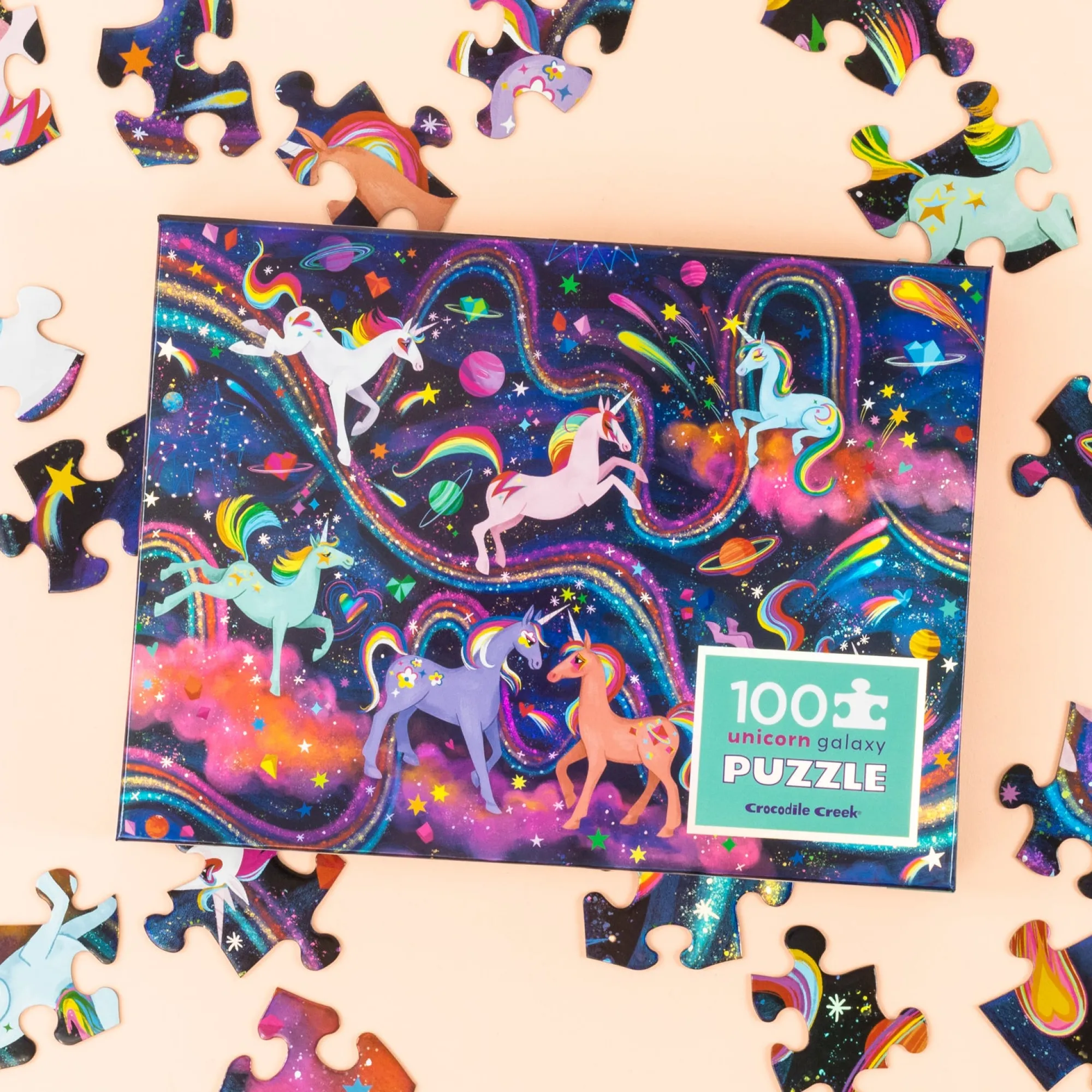 holographic_puzzle__piece_1-2.webp Crocodile Creek Puzzles>Holographic Puzzle 100 pieces Unicorn Galaxy - 5+